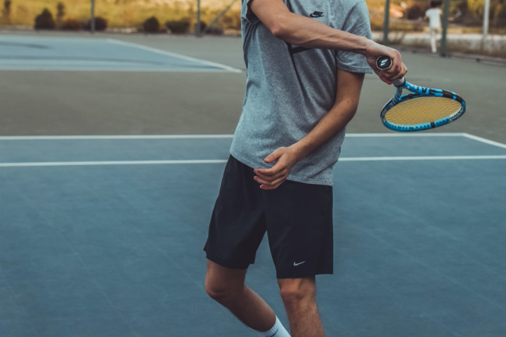 A Boy Playing Tennis