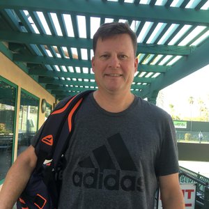 Giles Austin. Tennis Coach