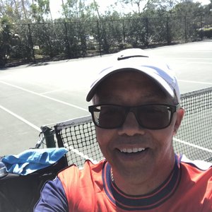 Eugene Brice II. Tennis Coach